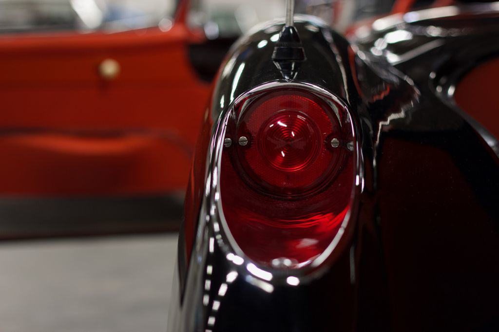 A black 1957 Chevy Corvette tail light in The Vault
